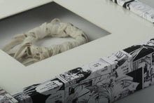 Load image into Gallery viewer, Square box frame covered with asian comics and porcelaneous stonewear wreath within. ''Maypole''