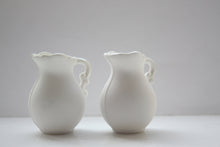 Load image into Gallery viewer, Mini jug made from pure white fine bone china and mother of pearl rim and handle in stoneware