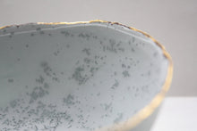 Load image into Gallery viewer, Stoneware porcelain bowl in duck egg blue with mat gold rims mat interior and crystals.