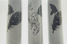 Load image into Gallery viewer, Bud vase made from gray earthenware with glossy effect and a butterfly on a feather