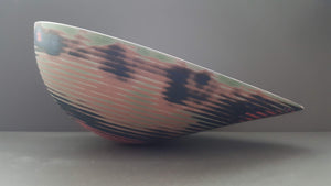 English fine bone china stoneware bowl with a unique patterned surface and unusual shape.