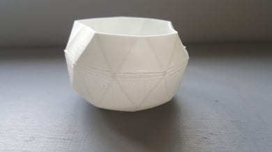 Geometric faceted polyhedron white candle holder made from fine bone china in organic finish