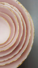 Load image into Gallery viewer, Set of 7 stoneware fine bone china nesting bowls in dusty pink and white with various finishes.