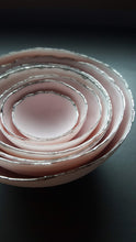 Load image into Gallery viewer, Set of 7 stoneware fine bone china nesting bowls in dusty pink and white with various finishes.