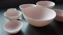 Load image into Gallery viewer, Set of 7 stoneware fine bone china nesting bowls in dusty pink and white with various finishes.