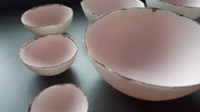 Load image into Gallery viewer, Set of 7 stoneware fine bone china nesting bowls in dusty pink and white with various finishes.