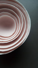 Load image into Gallery viewer, Set of 7 stoneware fine bone china nesting bowls in dusty pink and white with various finishes.