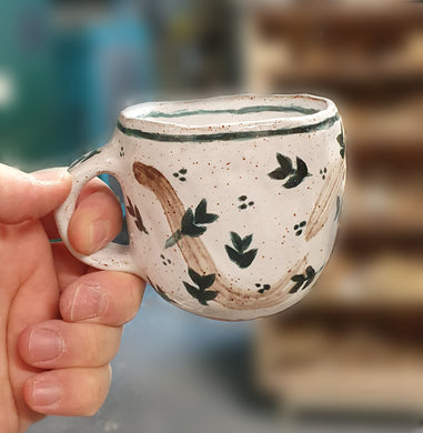 October 2023: Design and build a mug or a cup and decorate it with impressed found objects.