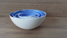 Load image into Gallery viewer, Set of 7 stoneware fine bone china nesting bowls in blue and white.