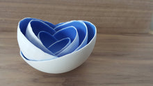 Load image into Gallery viewer, Set of 7 stoneware fine bone china nesting bowls in blue and white.