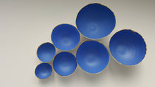 Load image into Gallery viewer, Set of 7 stoneware fine bone china nesting bowls in blue and white with real gold finish.