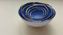 Load image into Gallery viewer, Set of 7 stoneware fine bone china nesting bowls in blue and white with real platinum finish.