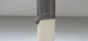 Decorative thin tall mini vase made out of stoneware porcelain and mat metallic glaze finish with a drip - bud vase one of a kind