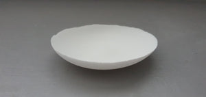Small shallow dishes from stoneware fine bone china in pure white or with shimmering gold finish, stoneware porcelain, white ceramic,