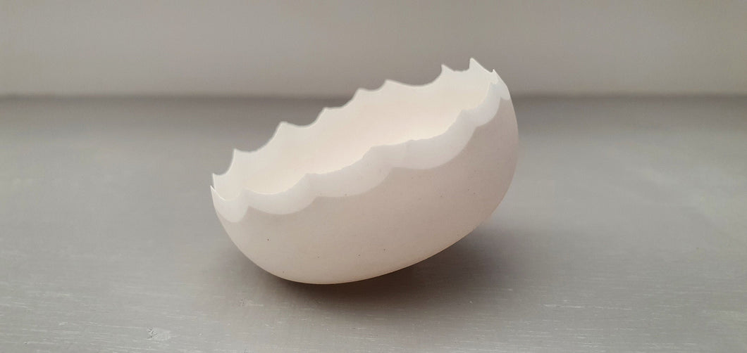 Small snow white vessel with serrated rims made from English fine bone china - limited edition