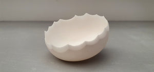 Small snow white vessel with serrated rims made from English fine bone china - limited edition