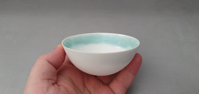 Stoneware English fine bone china vessel with light blue mother of pearl interior rims- iridescent