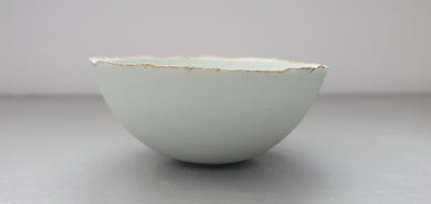 Half price second. Pastel pistachio green porcelain bowl. Stoneware porcelain bowl with gold rims.