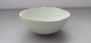 Half price second. Pastel pistachio green porcelain bowl. Stoneware porcelain bowl with gold rims.