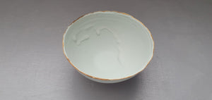 Half price second. Pastel pistachio green porcelain bowl. Stoneware porcelain bowl with gold rims.