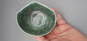 Shades of white bowl made from stoneware fine bone china with green glazed interior