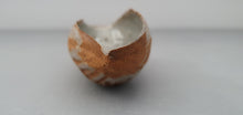 Load image into Gallery viewer, Hand curled big walnut shell in earthy woody colour in stoneware with clear glossy interior