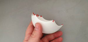 Small snow white vessel with serrated rims made from English fine bone china red glass droplets- one off piece