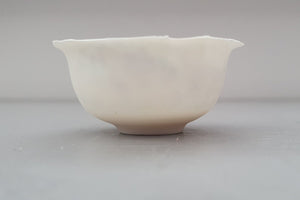 Miniature white vessel with glossy glaze interior made from English fine bone china - one off