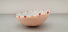 Load image into Gallery viewer, Small peach in colour vessel with serrated rims made from English fine bone china red glass droplets- one off piece