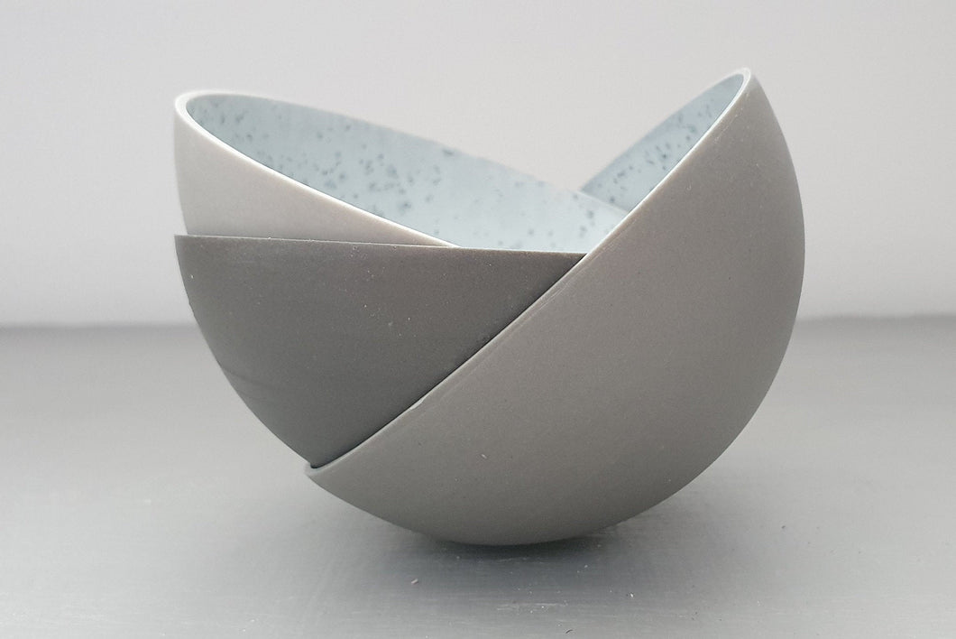 Porcelain bowl. Stoneware Parian porcelain bowl in 3 shades of grey with mat interior and crystals.