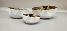 Load image into Gallery viewer, Nesting bowls. Set of 3 geometric faceted polyhedron fine bone china nesting stoneware bowls with gold interior. One of a kind.