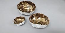 Load image into Gallery viewer, Nesting bowls. Set of 3 geometric faceted polyhedron fine bone china nesting stoneware bowls with gold interior. One of a kind.