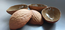 Load image into Gallery viewer, Big walnut shells in earthy woody colour in stoneware with clear glossy interior , ring dish - ring holder