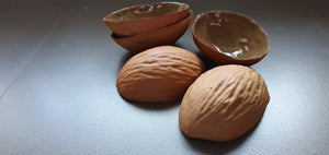 Big walnut shells in earthy woody colour in stoneware with clear glossy interior , ring dish - ring holder