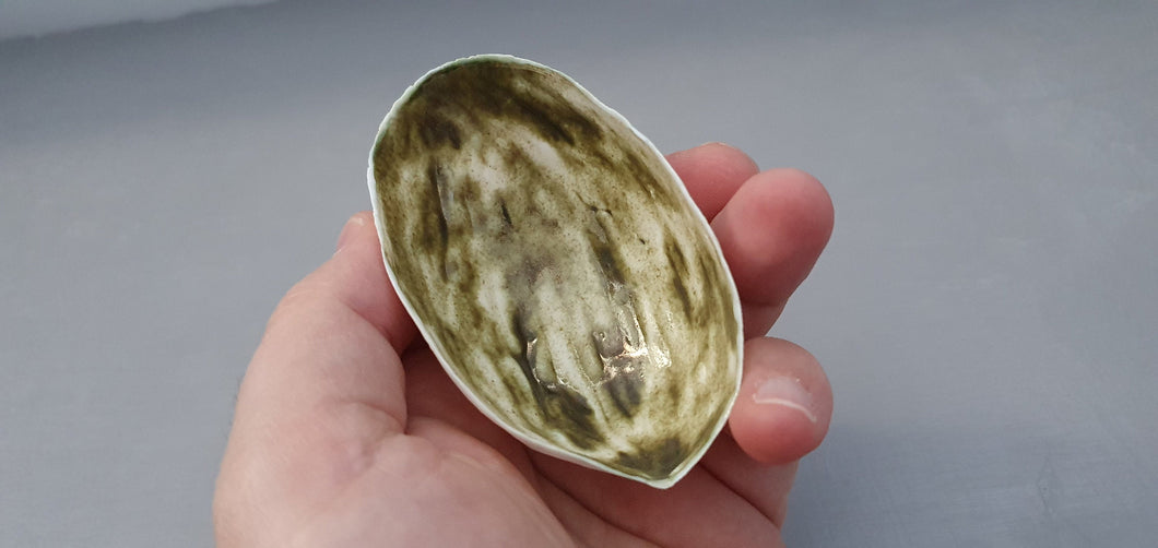 Ring holder. Big walnut shells made from stoneware fine bone china with glazed interior in green glaze- ring dish - ring holder