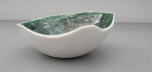 Shades of white bowl made from stoneware fine bone china with green glazed interior