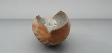 Load image into Gallery viewer, Hand curled big walnut shell in earthy woody colour in stoneware with clear glossy interior