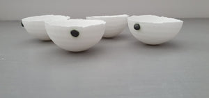 Small snow white vessel with black embossed dot made from English fine bone china - one of a kind
