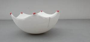 Small snow white vessel with serrated rims made from English fine bone china red glass droplets- one off piece