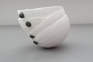 Small snow white vessel with black embossed dot made from English fine bone china - one of a kind