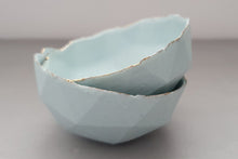 Load image into Gallery viewer, Geometric faceted polyhedron bowl in sky blue made from stoneware Parian porcelain with real gold finish -  geometric decor