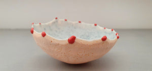 Small peach in colour vessel with serrated rims made from English fine bone china red glass droplets- one off piece