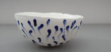 Load image into Gallery viewer, Small snow white vessel with glossy clear interior and blue droplets exterior made from English fine bone china - one of a kind