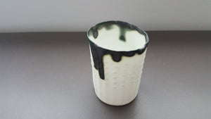 Stoneware white small vase in English fine bone china with burnt effect rims and textured surface.
