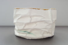 Load image into Gallery viewer, White with gold vessel. Crumpled paper-looking vessel made out of fine bone china with real gold and a hint of turquoise
