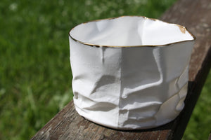 White with gold vessel. Crumpled paper-looking vessel made out of fine bone china with real gold