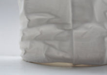 Load image into Gallery viewer, Crumpled paper looking vessel made out of English fine bone china and mother of pearl.