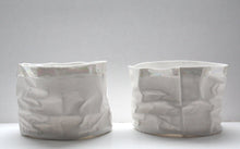 Load image into Gallery viewer, Crumpled paper looking vessel made out of English fine bone china and mother of pearl.