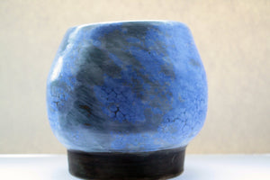 Round stoneware bowl with blue and grey glaze