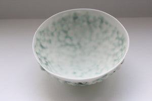 Stoneware bowl from English fine bone china with a unique textured surface and a hint of green